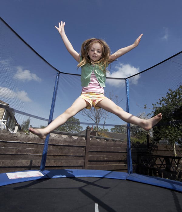 Kids jumping 2024 on trampoline